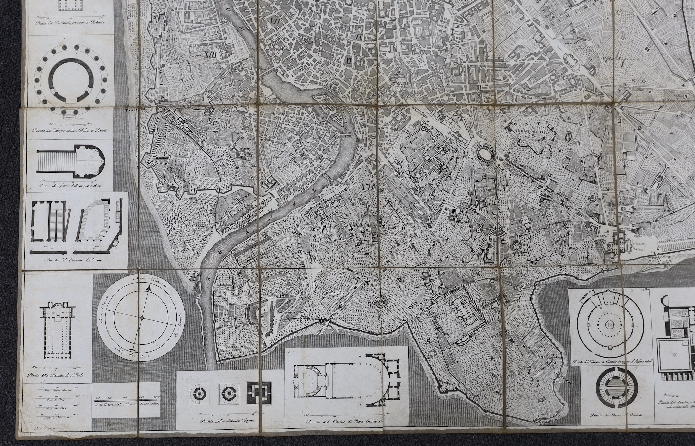 (Rome) Pianta Topgrafica dela Citta di Roma ... folded large scale plan, dissected and mounted on linen, engraved plans in surrounds, opens to approx. 44 x 82cms; some individual buildings and streets named, contained in